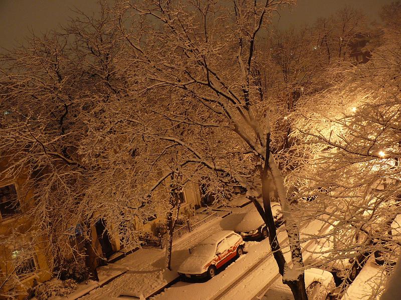 P1160089.JPG - Night time view of Newport Place from Win's roof as the snow begins.